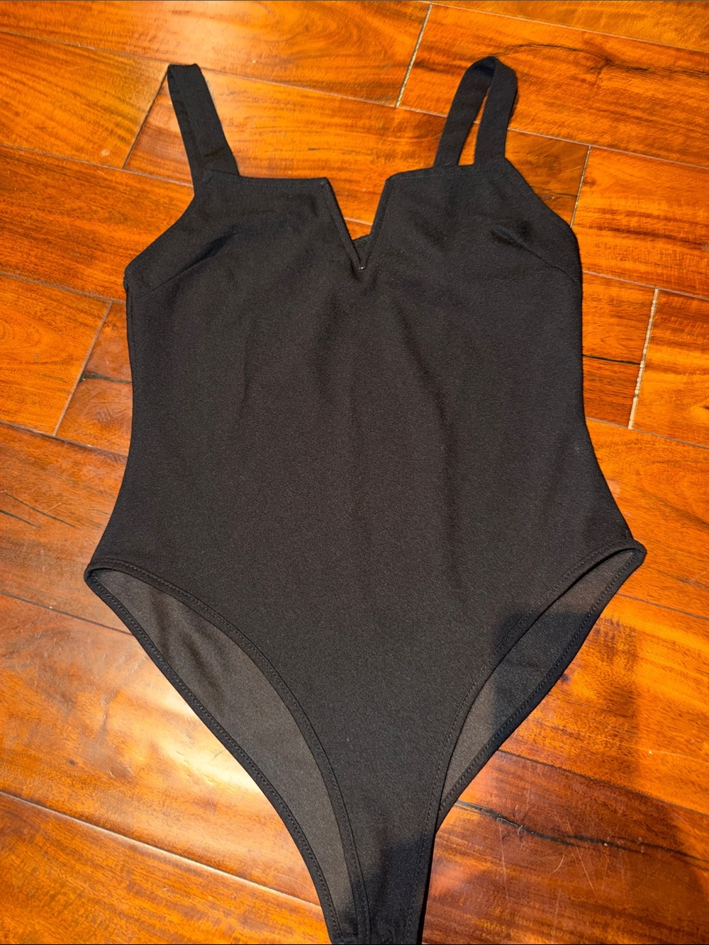 Women’s Black V-Notch Bodysuit - Sleek Everyday Layering Piece
